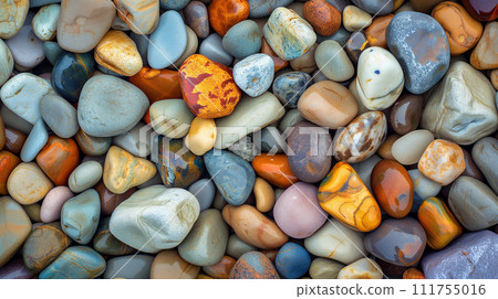 Colorful pebble texture for background, small stones in varying shades, colored beach stones Colorful pebble texture for background, small stones in varying shades, colored beach stones 111755016