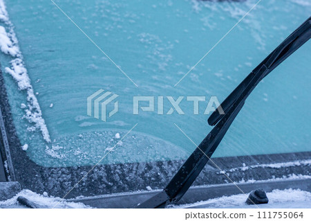 frozen car windshield 111755064