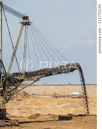 Opencast brown coal mine. Giant excavator. Opencast brown coal mine. Giant excavator. 111755240
