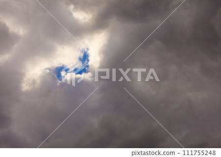 Dark stormy clouds covering the sky as nature background. Dark stormy clouds covering the sky as nature background. 111755248