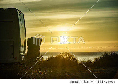 Caravan on nature in the morning at sunrise Caravan on nature in the morning at sunrise 111755604