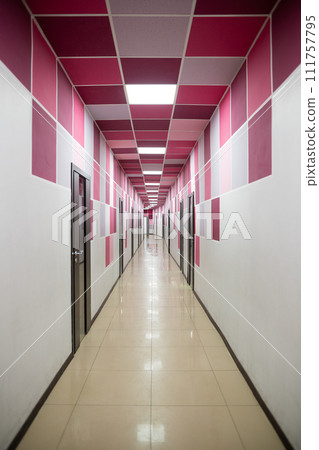 interior perspective of a long corridor with colored geometric lines interior perspective of a long corridor with colored geometric lines 111757795