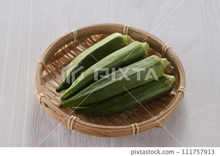 Okra in a colander Okra in a colander 111757913
