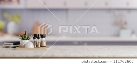 A copy space for display your product on a kitchen tabletop in a modern white and clean kitchen. A copy space for display your product on a kitchen tabletop in a modern white and clean kitchen. 111762603