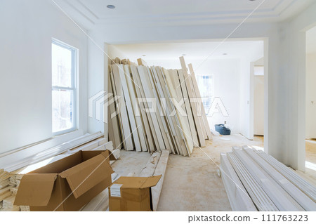 Interior wooden doors are being prepared for installation in new house Interior wooden doors are being prepared for installation in new house 111763223