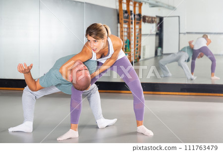 Active girl training captures on self-defense course 111763479