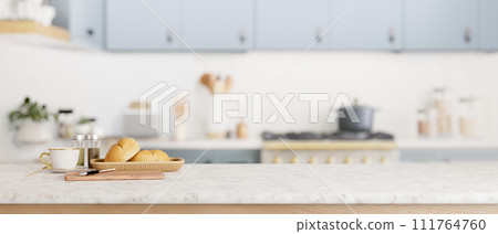 A copy space for display your product on a kitchen tabletop in a cozy minimal kitchen. A copy space for display your product on a kitchen tabletop in a cozy minimal kitchen. 111764760