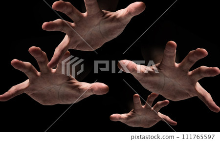 Horror image of the devil's hand approaching from the darkness 111765597
