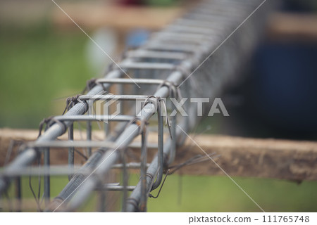Iron rebar wire reinforcement of concrete work. Construction site objects of bending cutting steel wire fences bar. Civil construction engineering concept. pile of under-construction materials 111765748