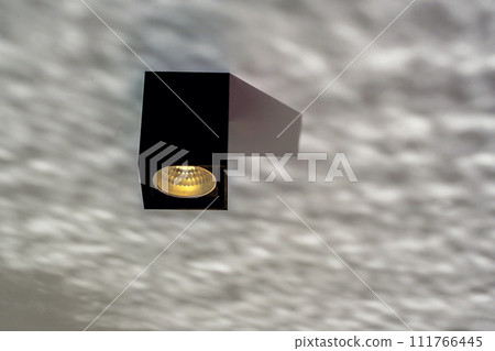 One modern glowing ceiling lamp. 111766445