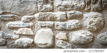 White brick wall, texture of whitened masonry as a background White brick wall, texture of whitened masonry as a background 111766997