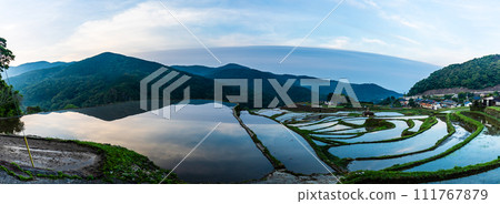 Onakao rice terraces, morning landscape filled with water at dawn, panorama [Nagasaki City] 111767879