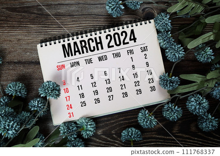 March 2024 monthly calendar with flower bouquet decoration on wooden background March 2024 monthly calendar with flower bouquet decoration on wooden background 111768337
