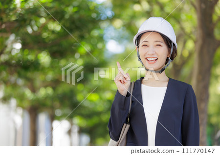 woman wearing a helmet 111770147