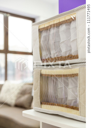 Two samples of modern orthopedic mattress presented in show room. 111771495