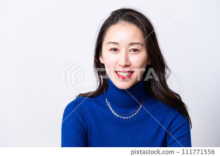 Around 40 women looking at camera 111771556