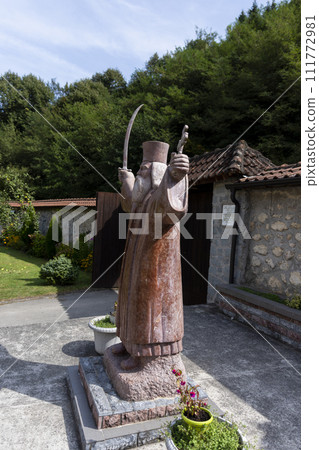 Monument of Hadzi Milentije at medieval monastery Raca at Tara mountain in western Serbia 111772981