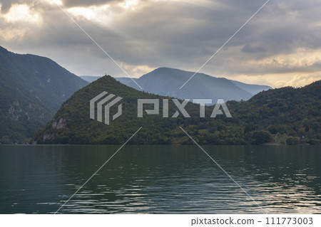 Lake Perucac and Tara mountain with amazing sky at sunset 111773003