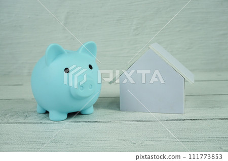 Piggy with house model business and real estate concept background Piggy with house model business and real estate concept background 111773853