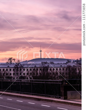 Colorful Sunset over huge transmitter tower above German town Koblenz and the Middle Rhine valley 111773858