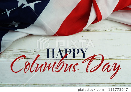 Happy Columbus Day text messege  with USA flag on wooden background 111773947