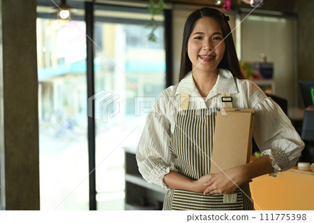 Small business entrepreneur owner holding brown ecological package box. Eco friendly products concept 111775398