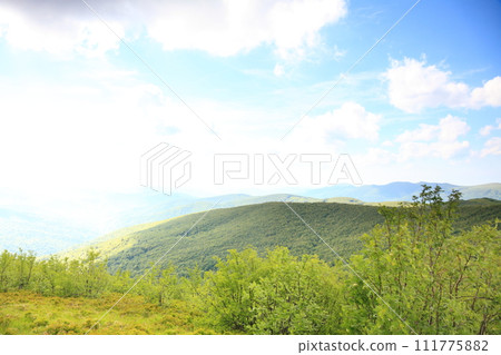 Nature. Green mountain landscape in the summer Nature. Green mountain landscape in the summer 111775882