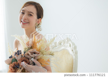 Young woman in wedding dress Young woman in wedding dress 111776121