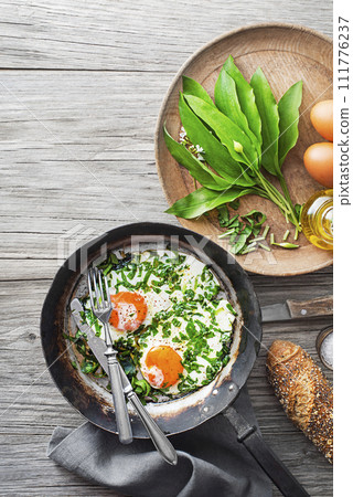 Fried egg wild garlic 111776237