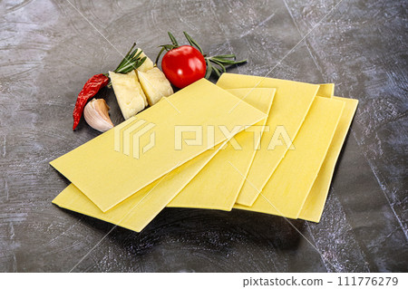 Uncooked raw Lasagna dry sheets Uncooked raw Lasagna dry sheets 111776279