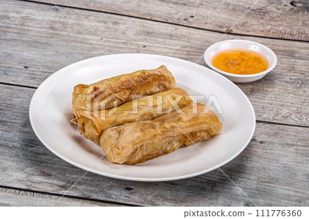 Traditional crispy fried stuffed springroll Traditional crispy fried stuffed springroll 111776360