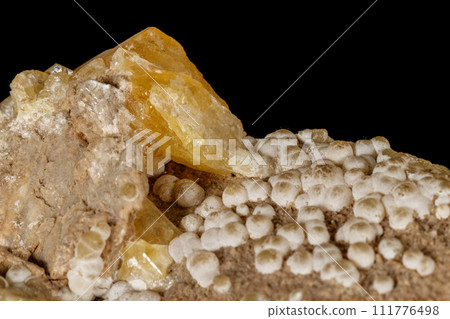 Macro stone Aragonite mineral on a black background 111776498