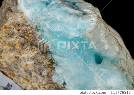 Macro stone cobalt calcite mineral on a black background 111776512