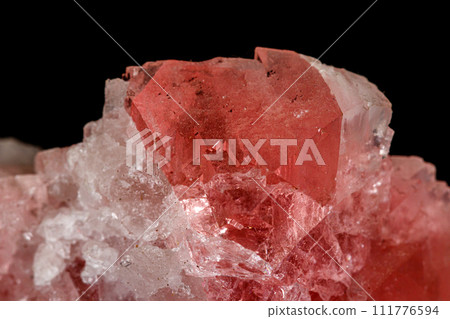 Macro stone mineral Fluorite on a black background Macro stone mineral Fluorite on a black background 111776594