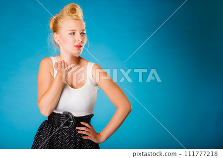 Retro pin up girl sending kiss. 111777218