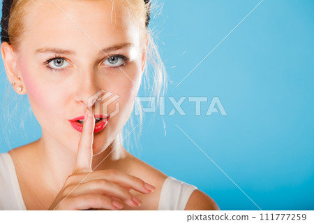 Girl hand with silence sign. 111777259
