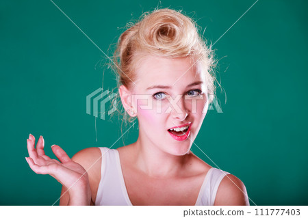 Astonishment young woman with pin up hair 111777403