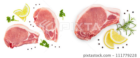 sliced raw pork meat with parsley and lemon isolated on white background. Top view. Flat lay sliced raw pork meat with parsley and lemon isolated on white background. Top view. Flat lay 111779228