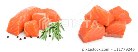 raw salmon piece cube with rosemary and peppercorn isolated on white background close up raw salmon piece cube with rosemary and peppercorn isolated on white background close up 111779246