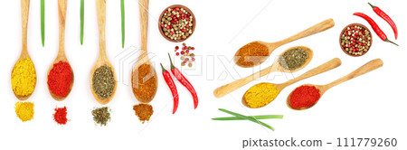 mix of spices in wooden spoon isolated on a white background. Top view. Flat lay. Set or collection 111779260