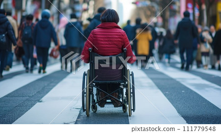 Woman Crossing Street in Wheelchair 111779548