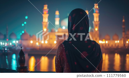 Silhouette of Woman in Niqab at Dusk 111779560