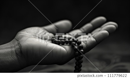 Hands Clasping a Rosary 111779622