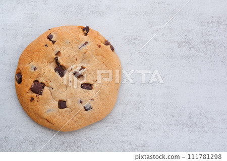 A chocolate chip cookie with a bittersweet flavor A chocolate chip cookie with a bittersweet flavor 111781298