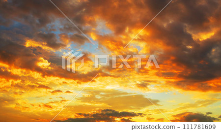 Beautiful scenery with a strong madder sunset sky (near Kawaguchi City, Saitama Prefecture) 111781609