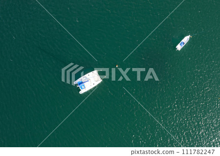 White small boats above top view White small boats above top view 111782247