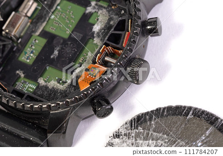 Broken smartwatch isolated on white background Broken smartwatch isolated on white background 111784207