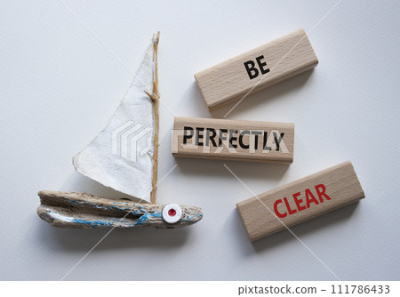 Be perfectly clear symbol. Concept words Be perfectly clear on wooden blocks. Beautiful white background with boat. Business and Be perfectly clear concept. Copy space 111786433