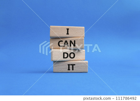 I can do it symbol. Concept words I can do it on wooden blocks. Beautiful blue background. Business and I can do it concept. Copy space. I can do it symbol. Concept words I can do it on wooden blocks. Beautiful blue background. Business and I can do it concept. Copy space. 111786492