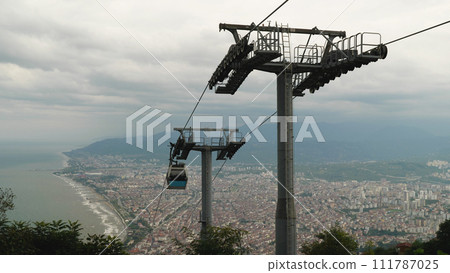 View from the Ordu-Boztepe cable car. Spectacular views of the bay, the town and the mountains beyond. Travelling in Turkey, along the Black Sea coast. View from the Ordu-Boztepe cable car. Spectacular views of the bay, the town and the mountains beyond. Travelling in Turkey, along the Black Sea coast. 111787025